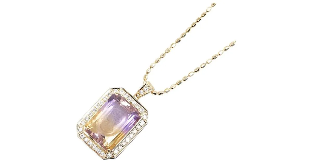 Collar de colgante Tasaki K18YG de oro amarillo con ametista de 12.40 ct y diamante de 0.58 ct en excelente estado Dorado 