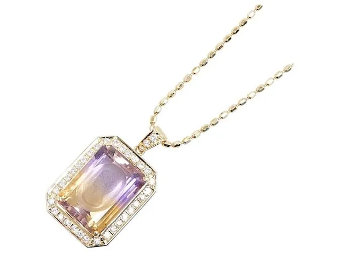 Collar de colgante Tasaki K18YG de oro amarillo con ametista de 12.40 ct y diamante de 0.58 ct en excelente estado Dorado 
