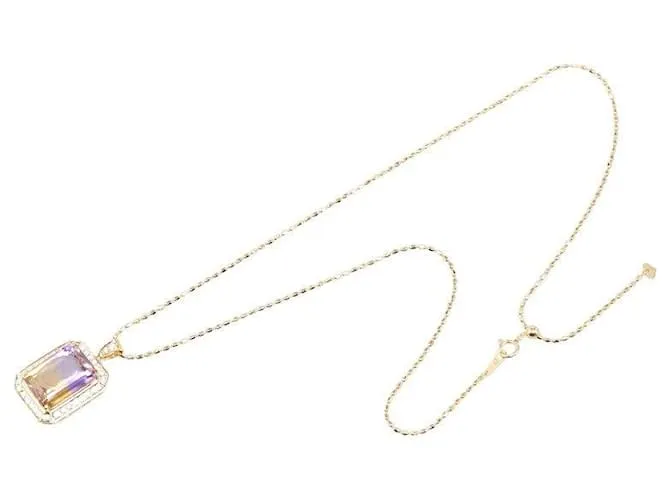 Collar de colgante Tasaki K18YG de oro amarillo con ametista de 12.40 ct y diamante de 0.58 ct en excelente estado Dorado 