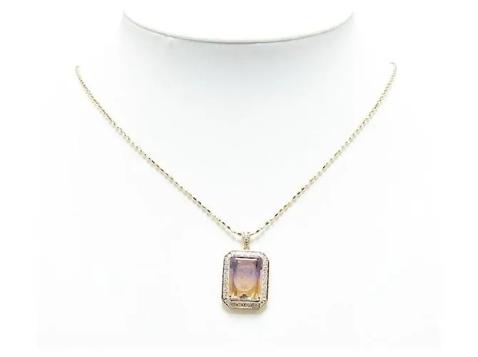 Collar de colgante Tasaki K18YG de oro amarillo con ametista de 12.40 ct y diamante de 0.58 ct en excelente estado Dorado 