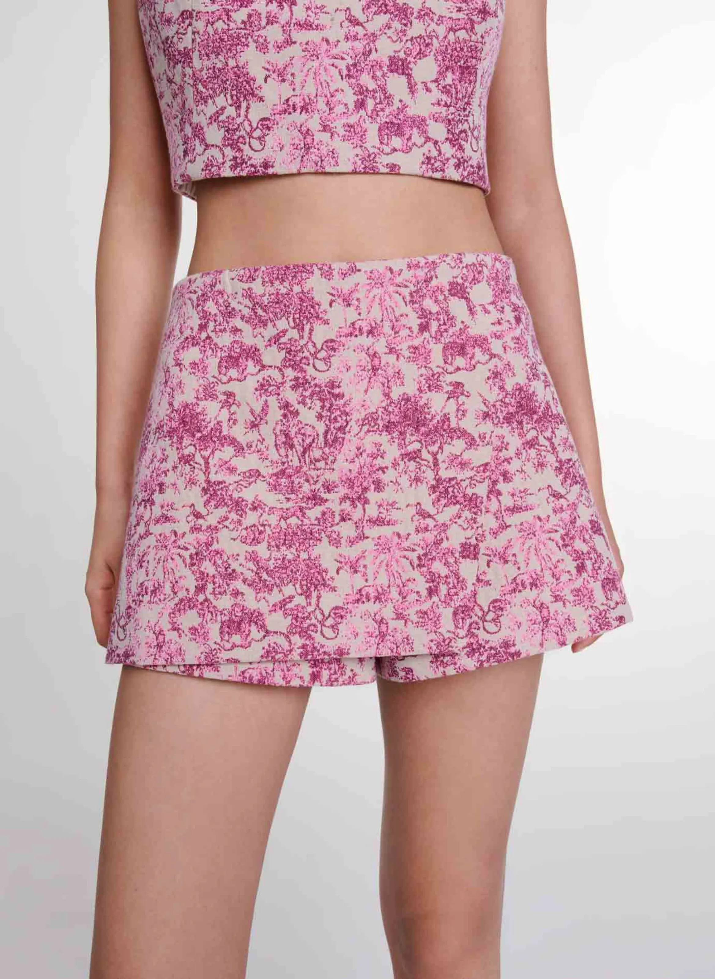 MAJE Minifalda corta estampada en mezcla de algodón. en rosa