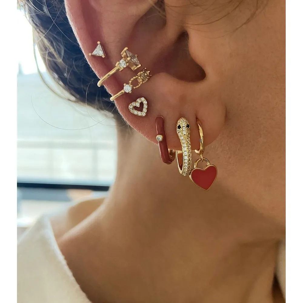 Piercing Triángulo Oro