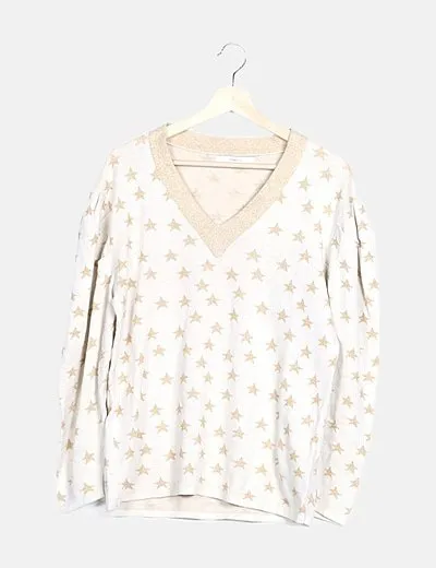 Uterqüe Suéter beige estrellas doradas